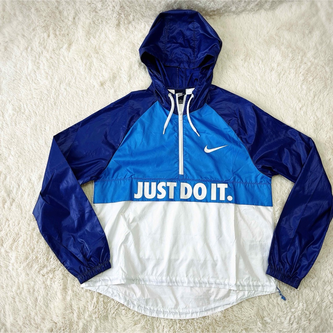 NIKE(ナイキ)のNIKEナイキ ナイロン JUST DO IT ウインドブレーカー ハーフジップ レディースのジャケット/アウター(ナイロンジャケット)の商品写真