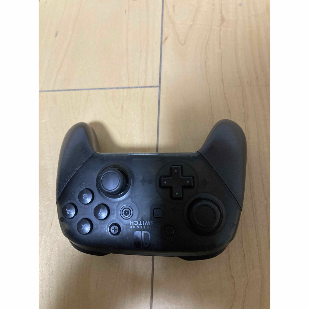 Nintendo Switch(ニンテンドースイッチ)の純正 プロコン ジャンク品　Nintendo Switch　中古 エンタメ/ホビーのゲームソフト/ゲーム機本体(その他)の商品写真