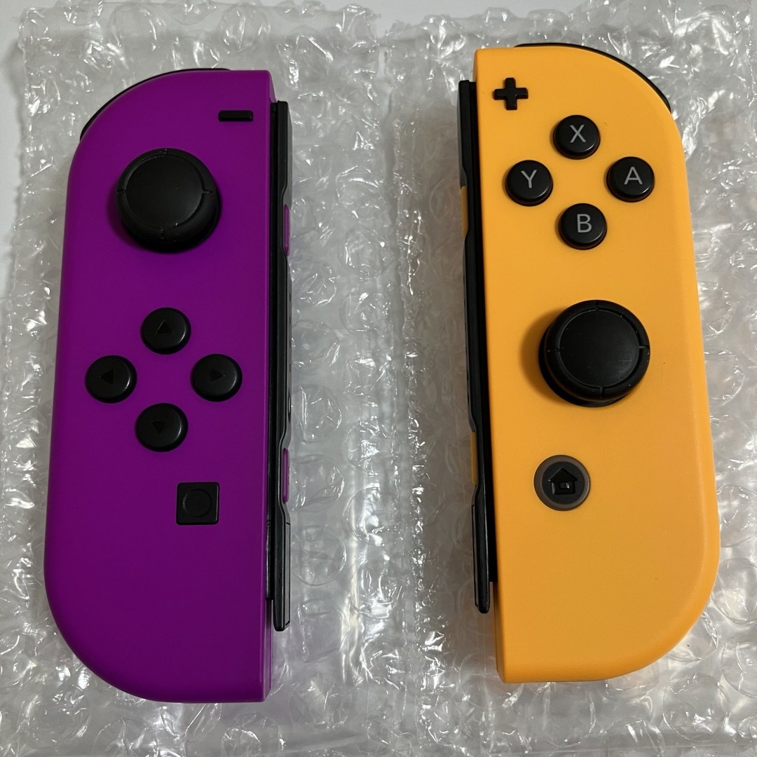 Nintendo Switch(ニンテンドースイッチ)のJoy-Con (L) ネオンパープル / (R) ネオンオレンジ エンタメ/ホビーのゲームソフト/ゲーム機本体(その他)の商品写真