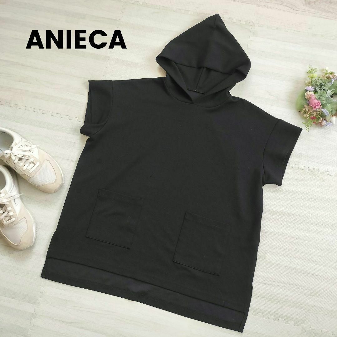 ANIECA(アニーカ)の【美品】ANIECA スクエア フードパーカー 半袖 ブラック アニーカ レディースのトップス(パーカー)の商品写真