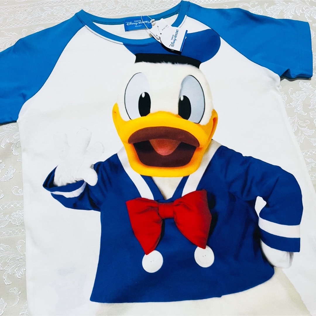 Disney(ディズニー)の新品タグ付き★レア★ドナルドダック実写Tシャツ★ディズニーリゾート公式グッズ レディースのトップス(Tシャツ(半袖/袖なし))の商品写真