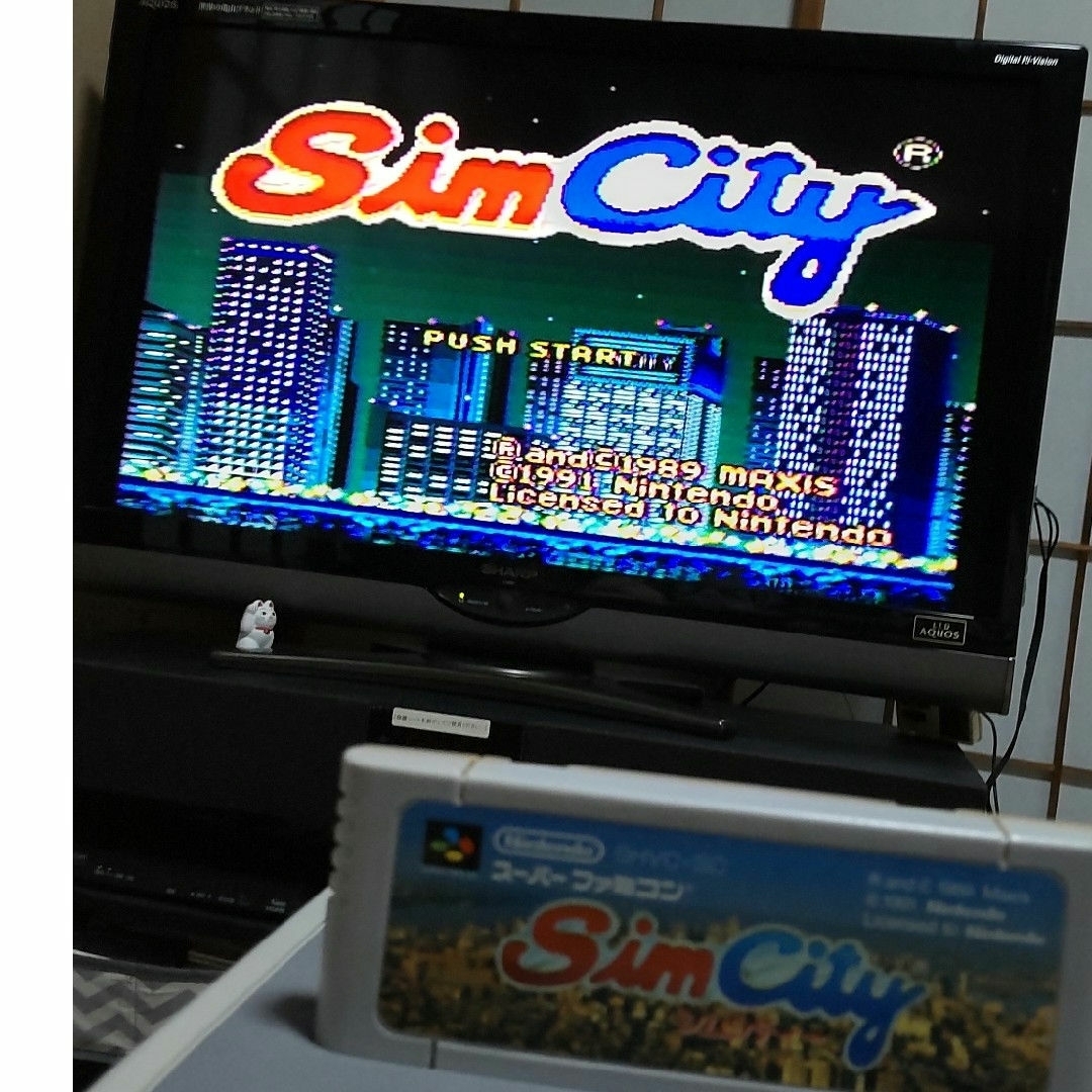 任天堂(ニンテンドウ)のスーパーファミコン『シムシティ』ソフトと『シムシティー必勝攻略法』 エンタメ/ホビーのゲームソフト/ゲーム機本体(家庭用ゲームソフト)の商品写真