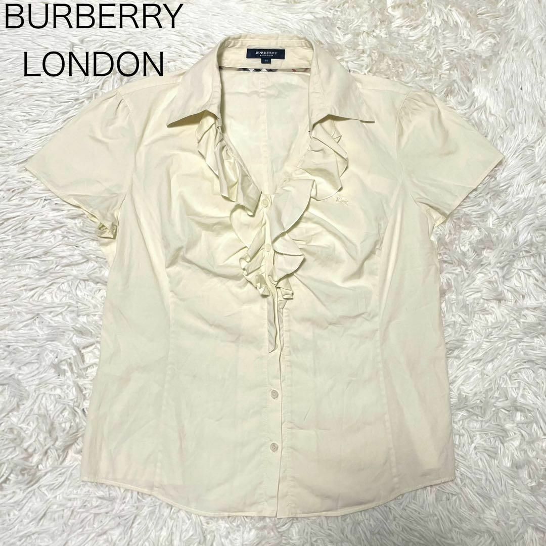 BURBERRY(バーバリー)の【バーバリーロンドン】半袖 ブラウス フリル ノバチェック ホースロゴ 白 40 レディースのトップス(シャツ/ブラウス(半袖/袖なし))の商品写真