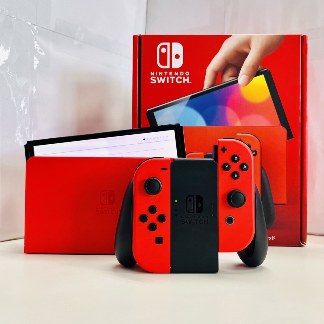 Nintendo Switch(ニンテンドースイッチ)の美品 有機ELモデル Nintendo Switch マリオレッド エンタメ/ホビーのゲームソフト/ゲーム機本体(家庭用ゲーム機本体)の商品写真