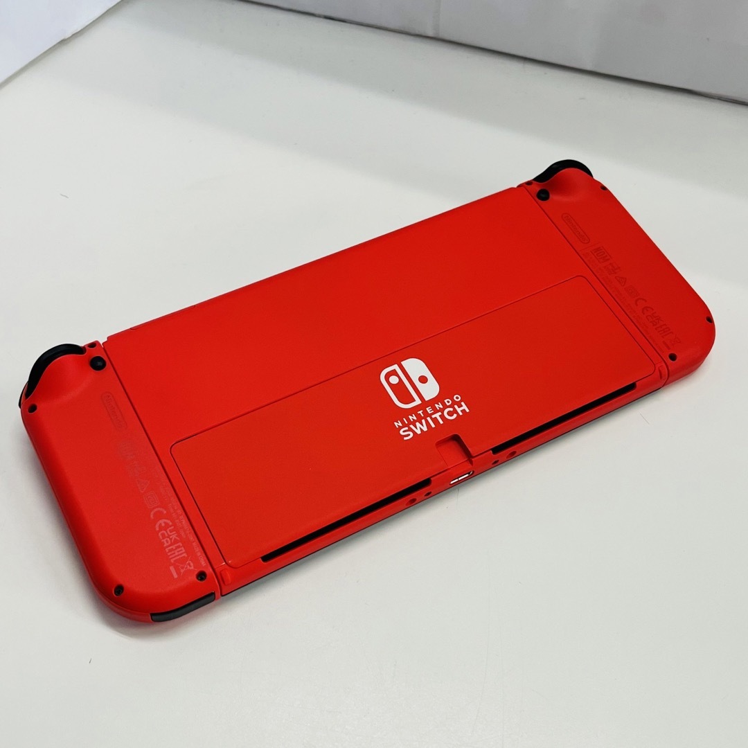 Nintendo Switch(ニンテンドースイッチ)の美品 有機ELモデル Nintendo Switch マリオレッド エンタメ/ホビーのゲームソフト/ゲーム機本体(家庭用ゲーム機本体)の商品写真