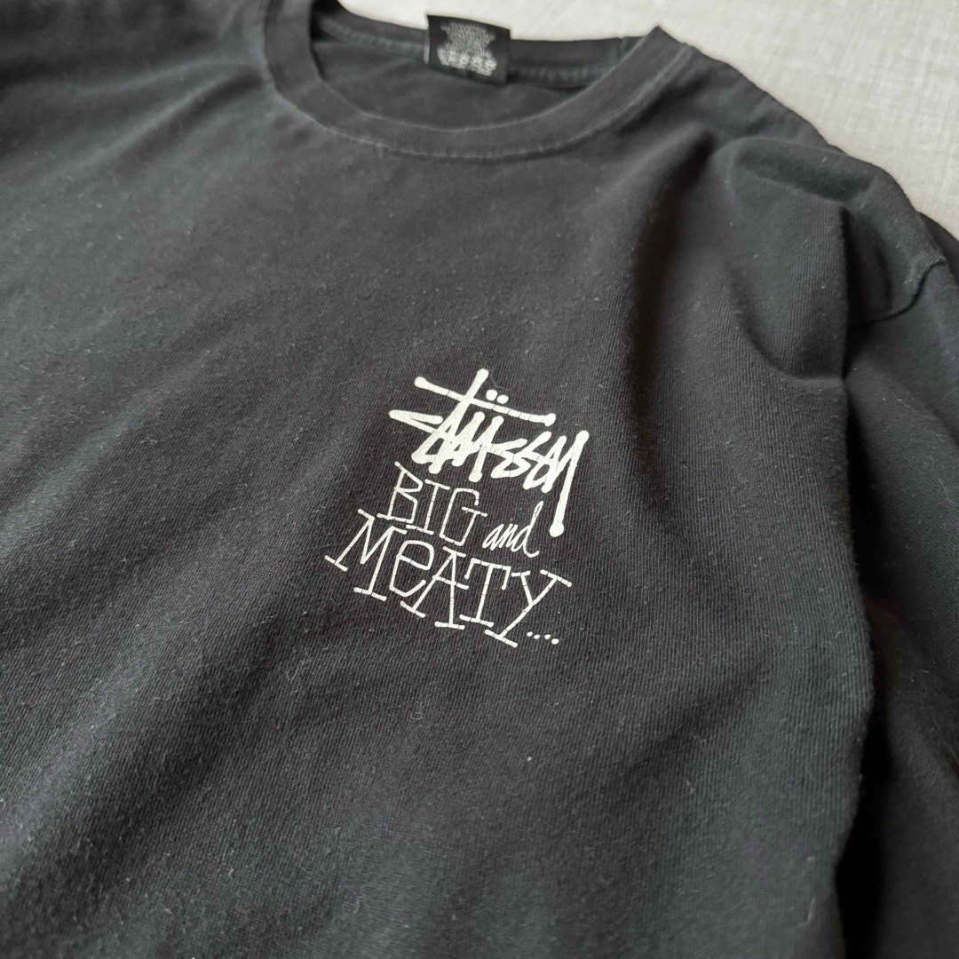 STUSSY(ステューシー)のStussy BIG MEATY ビッグマイティ 恐竜 フォント  ロンT 黒 メンズのトップス(Tシャツ/カットソー(七分/長袖))の商品写真