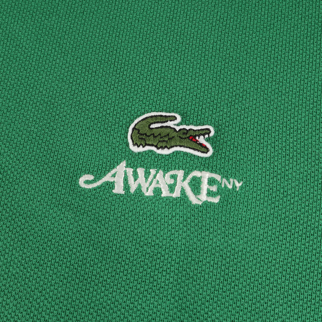 新品同様 Awake NY アウェイクニューヨーク Tシャツ サイズ:M 22SS LACOSTE ピケ 鹿の子 クルーネック 半袖Tシャツ T-shirt グリーン トップス カットソー ラコステ コラボ【メンズ】【中古】 メンズのトップス(Tシャツ/カットソー(半袖/袖なし))の商品写真