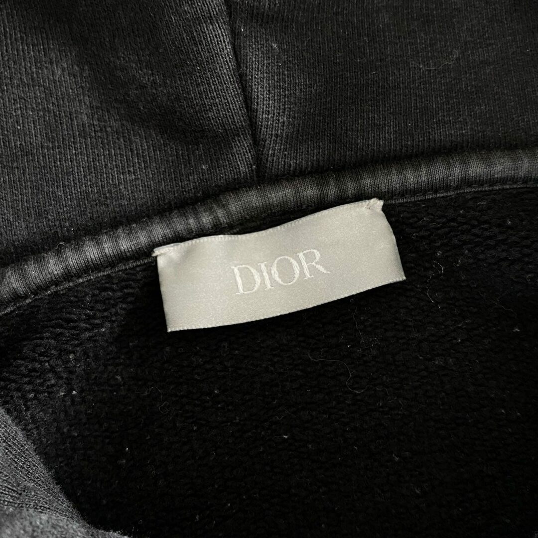 Dior(ディオール)の60e11 Dior Raymond Pettibon ディオール レイモンド ペティボン プルオーバー パーカー フーディ ロゴ刺繍 943J600E0531 XSサイズ ブラック コットン レディースのトップス(パーカー)の商品写真