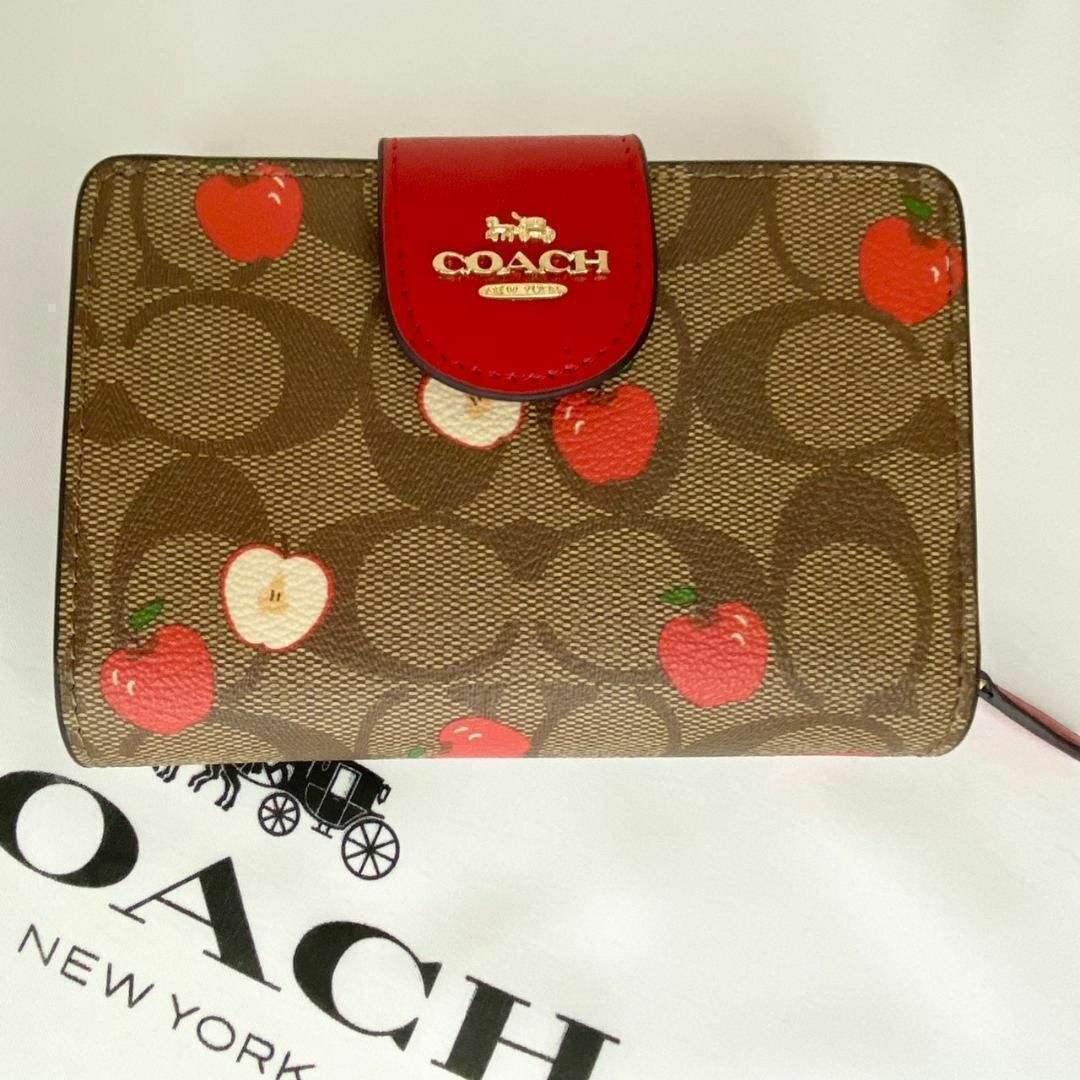 COACH(コーチ)の✨【新品未使用】COACH シグネチャー アップルプリント 二つ折り財布 レディースのファッション小物(財布)の商品写真