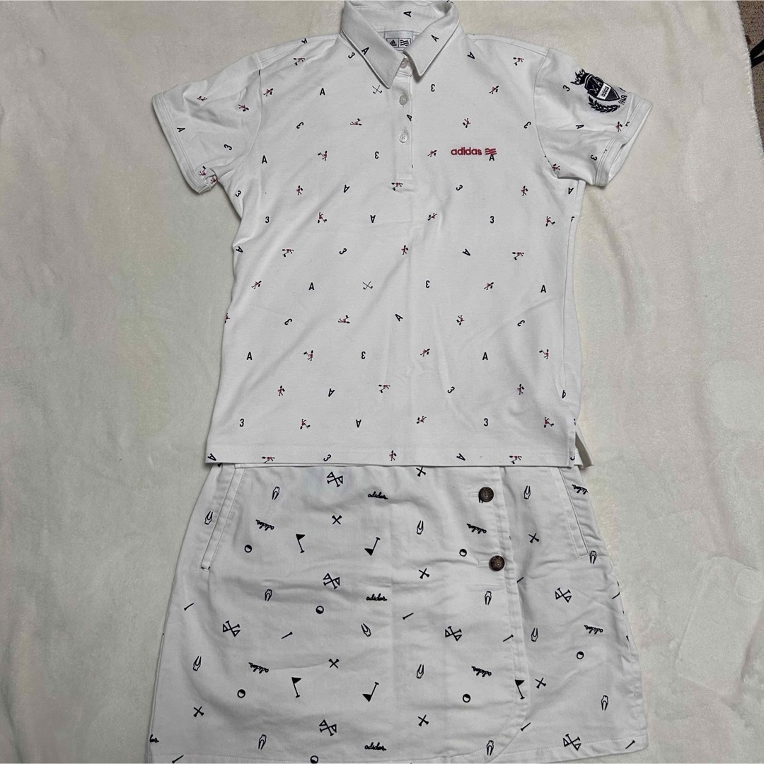 adidas(アディダス)のadidas ゴルフウェア　ポロシャツスカート　セットアップ　ホワイト　総柄 スポーツ/アウトドアのゴルフ(ウエア)の商品写真