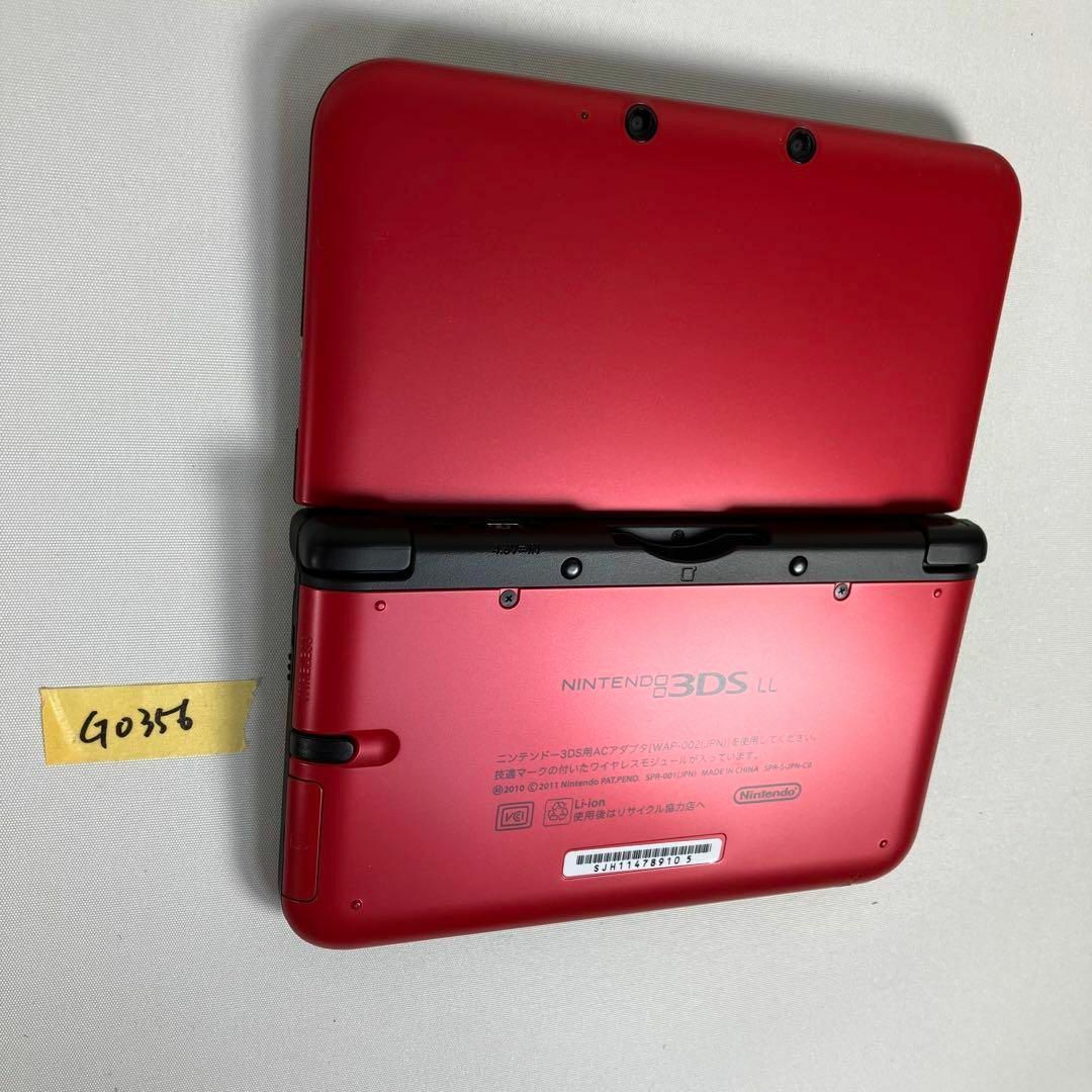 ニンテンドー3DS(ニンテンドー3DS)の【G0356】美品 完品 ニンテンドー3DS LL レッド×ブラック エンタメ/ホビーのゲームソフト/ゲーム機本体(携帯用ゲーム機本体)の商品写真