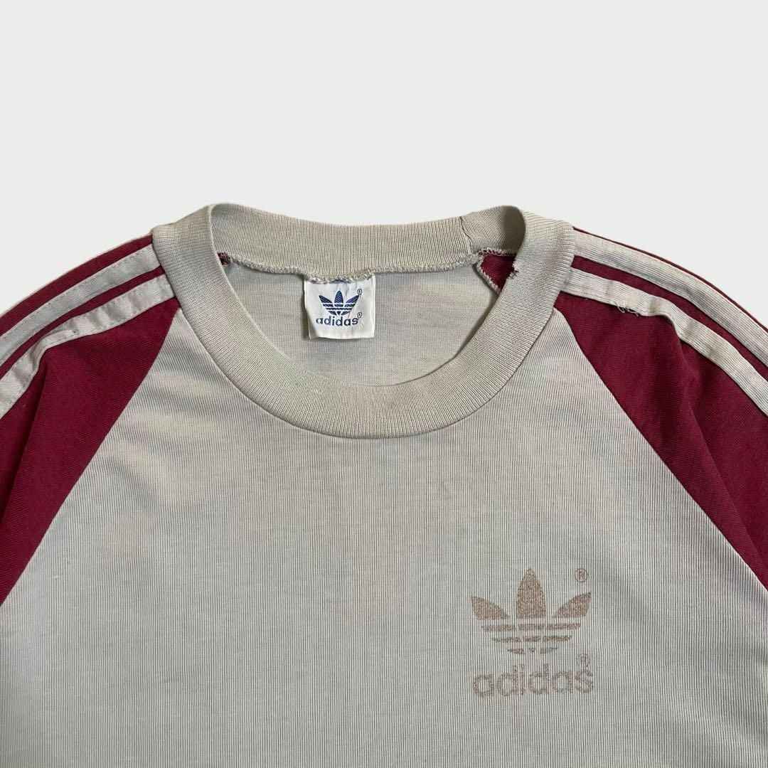 adidas(アディダス)のアディダス　80s　Tシャツ　ラグラン　ビンテージ　トレフォイルロゴ　フェード その他のその他(その他)の商品写真