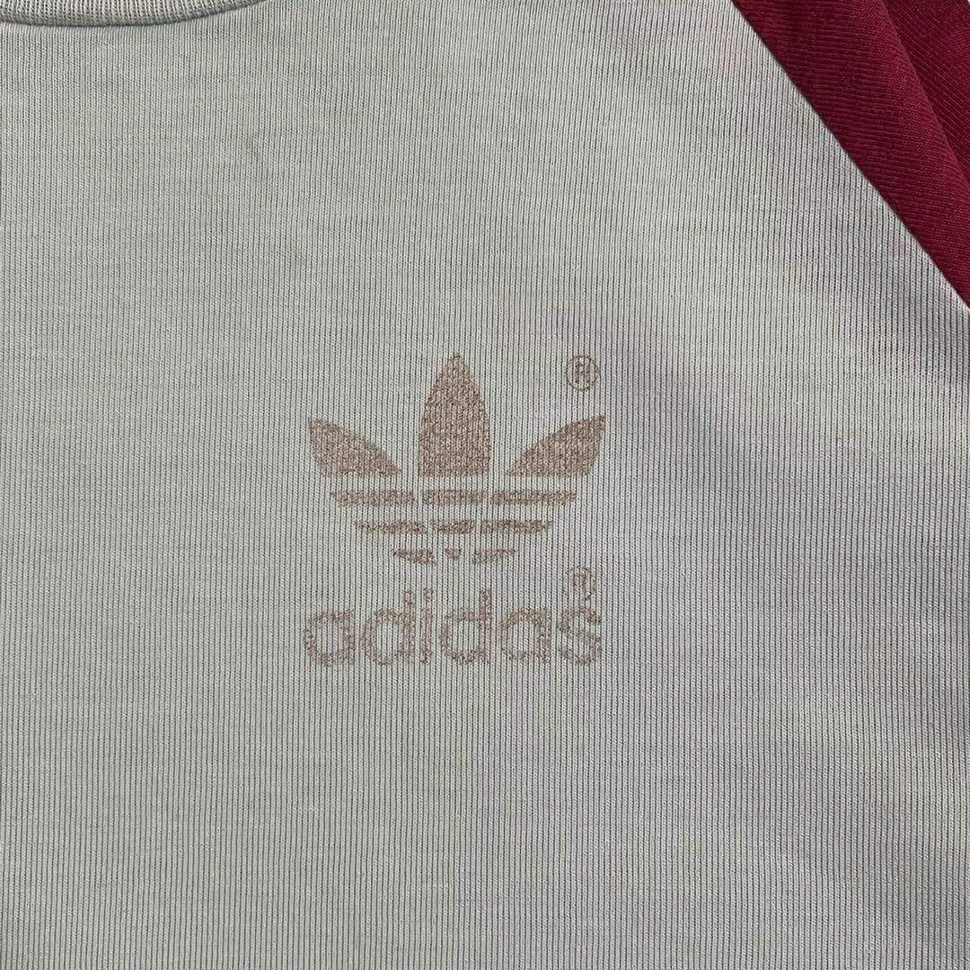 adidas(アディダス)のアディダス　80s　Tシャツ　ラグラン　ビンテージ　トレフォイルロゴ　フェード その他のその他(その他)の商品写真