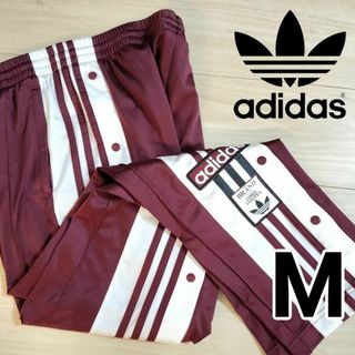 オリジナルス(Originals（adidas）)のアディダス 赤紫 アディブレイク スナップパンツ 女性M ジャージ ジェニー着用(その他)