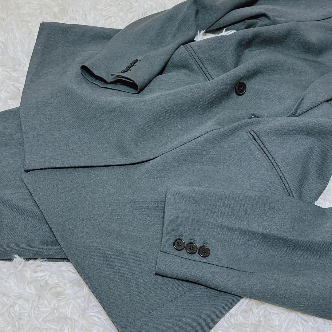 TAKEO KIKUCHI(タケオキクチ)の未使用級 tk タケオキクチ ダークグリーン セットアップスーツ ダブルブレスト メンズのスーツ(その他)の商品写真