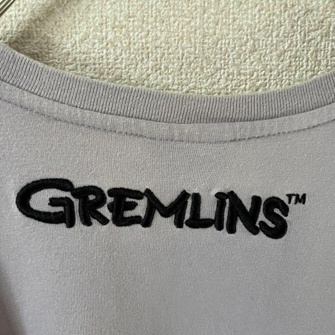 V3 グレムリン　tシャツ 半袖　背面刺繍　映画　Ｌレディース　紫系？ レディースのトップス(Tシャツ(半袖/袖なし))の商品写真