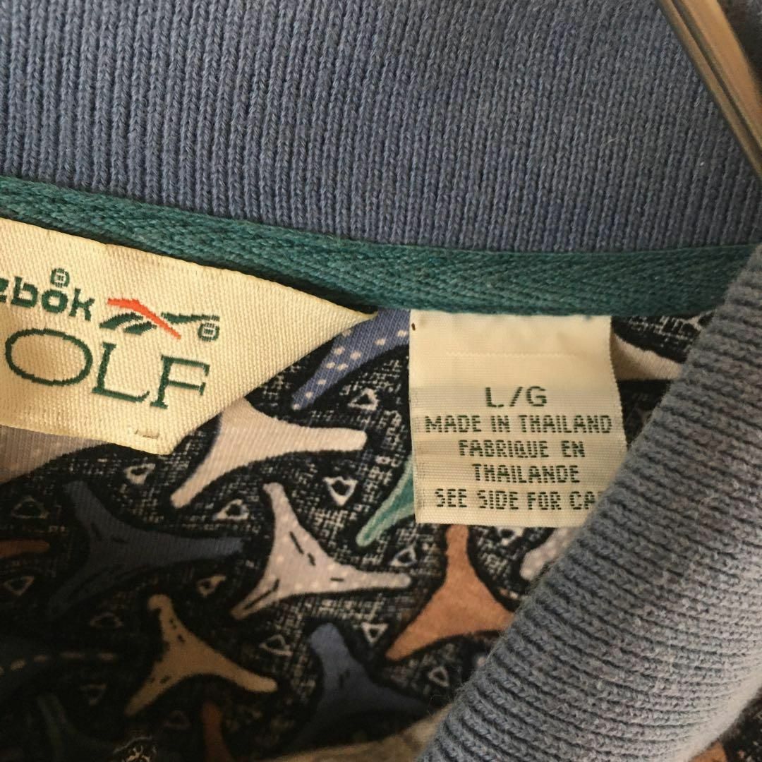 Reebok(リーボック)のU1リーボック　ゴルフ　RBK パターン柄ポロシャツ　半袖　Ｌメンズ 90s メンズのトップス(ポロシャツ)の商品写真