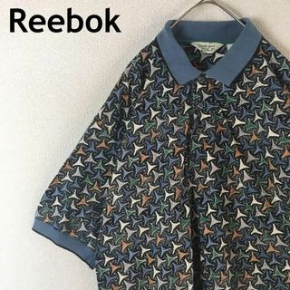 リーボック(Reebok)のU1リーボック　ゴルフ　RBK パターン柄ポロシャツ　半袖　Ｌメンズ 90s(ポロシャツ)