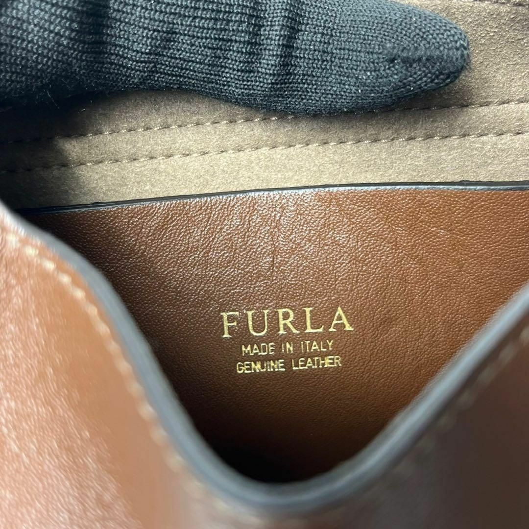 Furla(フルラ)の【美品】フルラ　クラブ　タッセル　ブラウン　ショルダーバッグ　パンチング レディースのバッグ(ショルダーバッグ)の商品写真