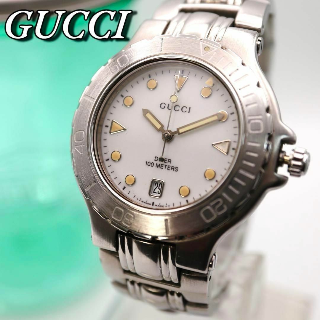 Gucci(グッチ)の良品！GUCCI デイト ダイバーウォッチ ラウンド メンズ腕時計 557 メンズの時計(腕時計(アナログ))の商品写真