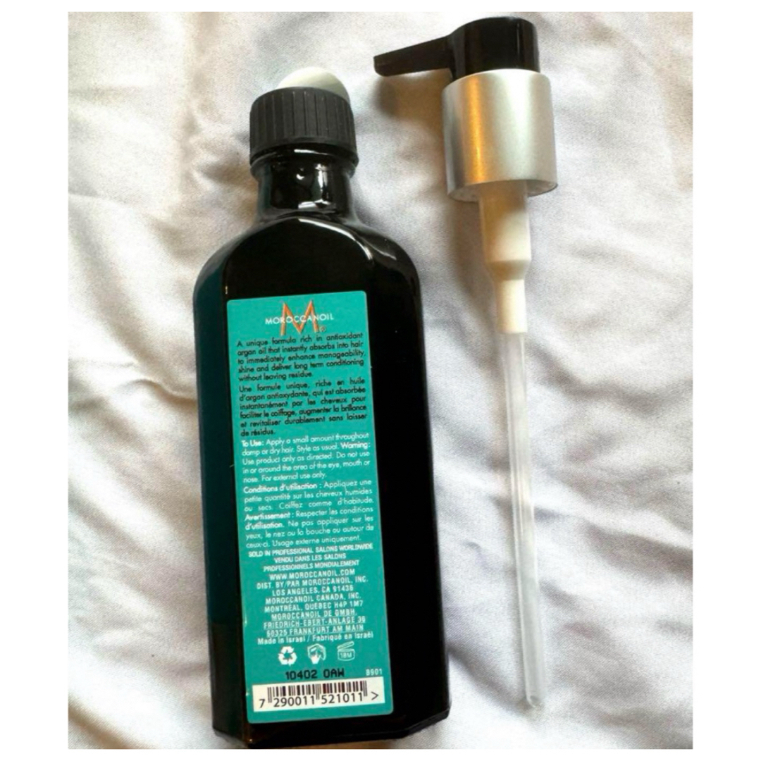 Moroccan oil(モロッカンオイル)の未使用品　モロッカンオイル　100ml x 3 本 コスメ/美容のヘアケア/スタイリング(トリートメント)の商品写真