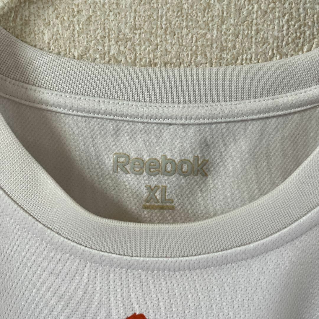 Reebok(リーボック)のT1 Reebok tシャツ 半袖　バスケット　ドライ　XLメンズ 白 メンズのトップス(Tシャツ/カットソー(七分/長袖))の商品写真