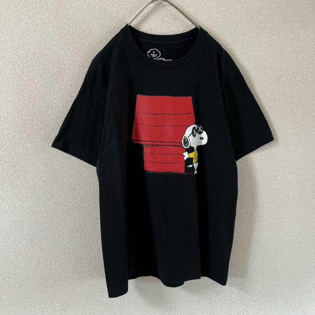 UNIQLO(ユニクロ)のU3 KAWS スヌーピー　UT 半袖　tシャツ 黒　Lレディース レディースのトップス(Tシャツ(半袖/袖なし))の商品写真