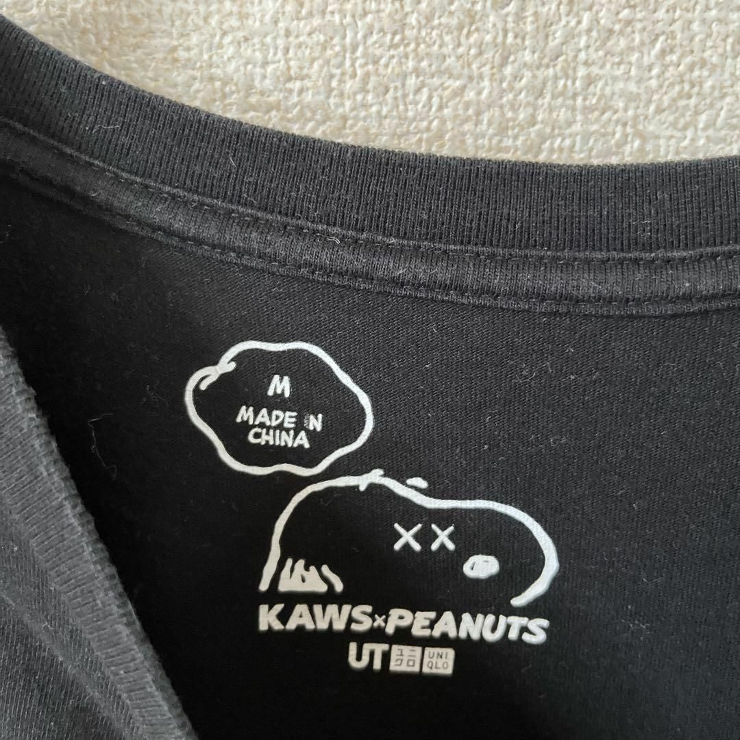 UNIQLO(ユニクロ)のU3 KAWS スヌーピー　UT 半袖　tシャツ 黒　Lレディース レディースのトップス(Tシャツ(半袖/袖なし))の商品写真