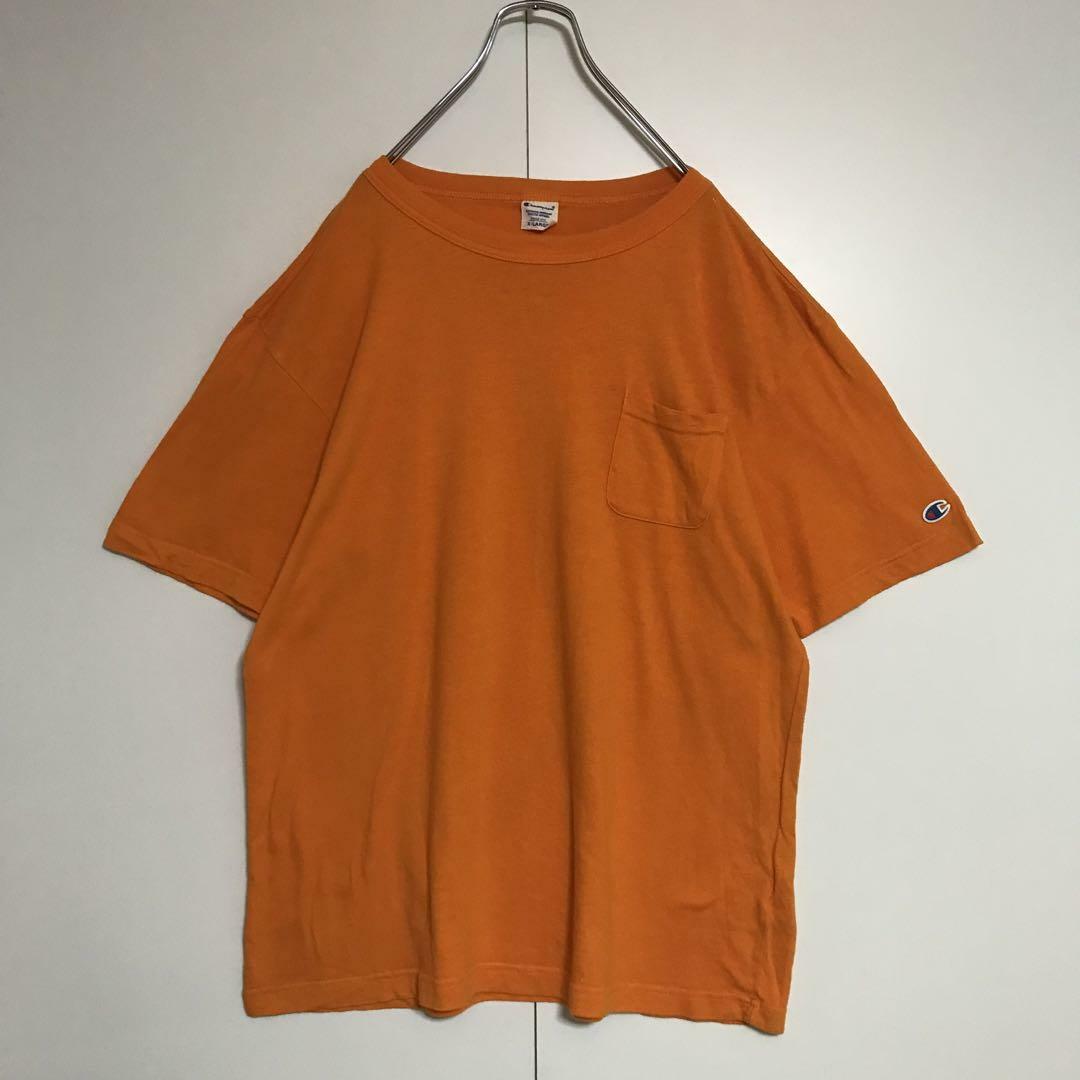 Champion(チャンピオン)の【美品】チャンピオン　袖ロゴ入りTシャツ　オレンジ　シンプル　ゆるだぼH820 メンズのトップス(Tシャツ/カットソー(半袖/袖なし))の商品写真