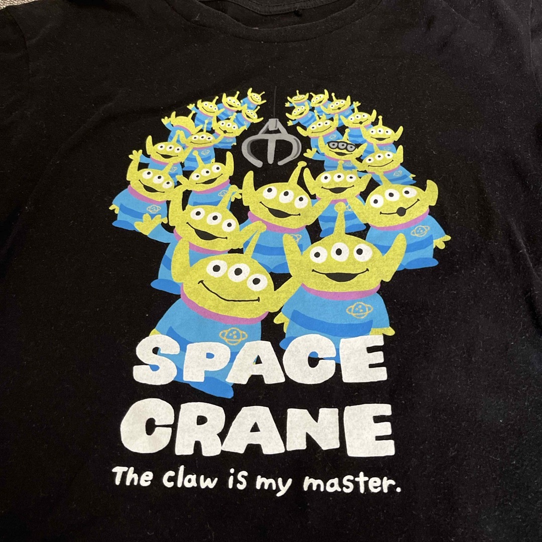 UNIQLO(ユニクロ)のユニクロ　ディズニー　Tシャツ　ブラック　SPACE CRANE 神しゃまー レディースのトップス(Tシャツ(半袖/袖なし))の商品写真