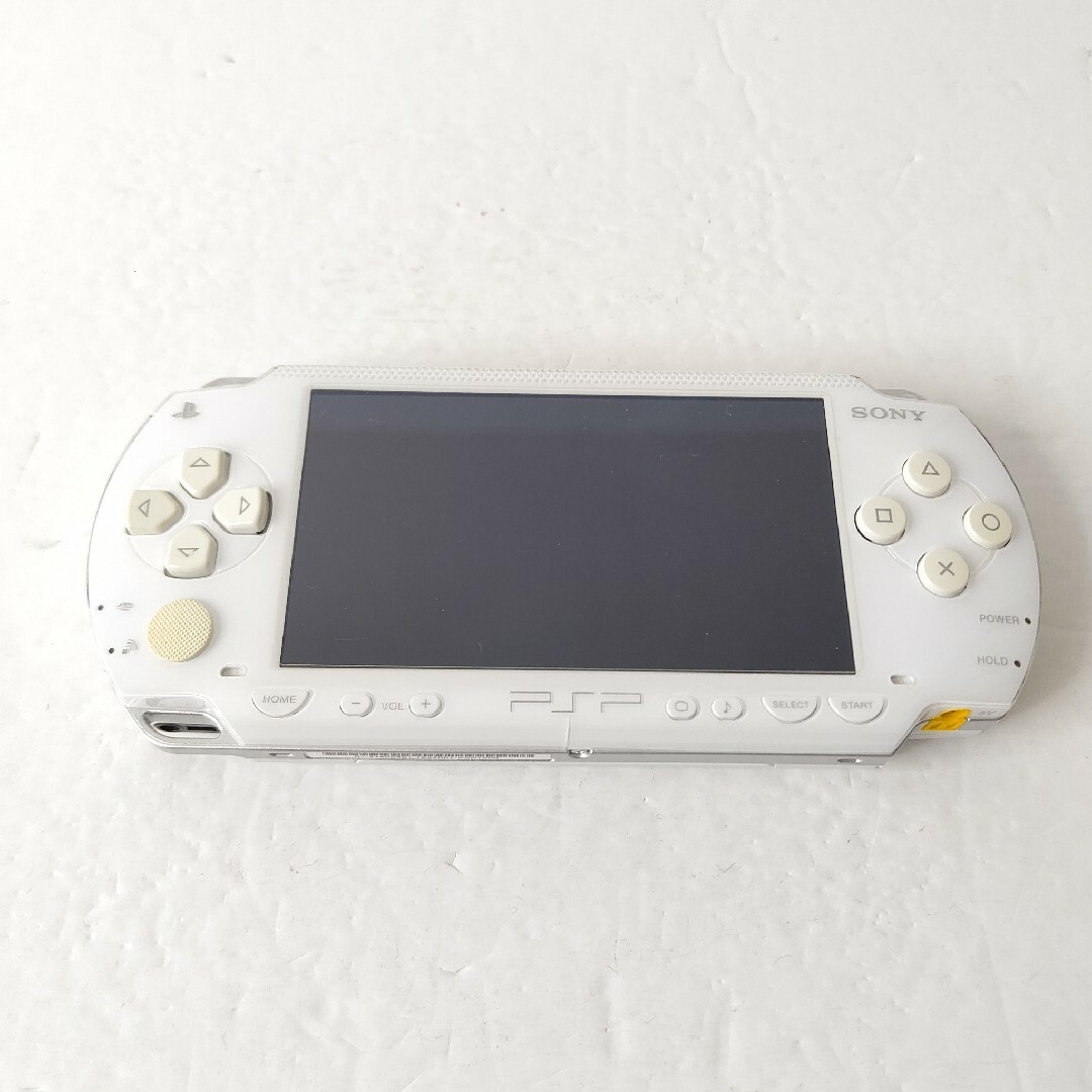 PlayStation Portable(プレイステーションポータブル)のSONY　PSP1000 セラミックホワイト　プレイステーションポータブル　美品 エンタメ/ホビーのゲームソフト/ゲーム機本体(携帯用ゲーム機本体)の商品写真