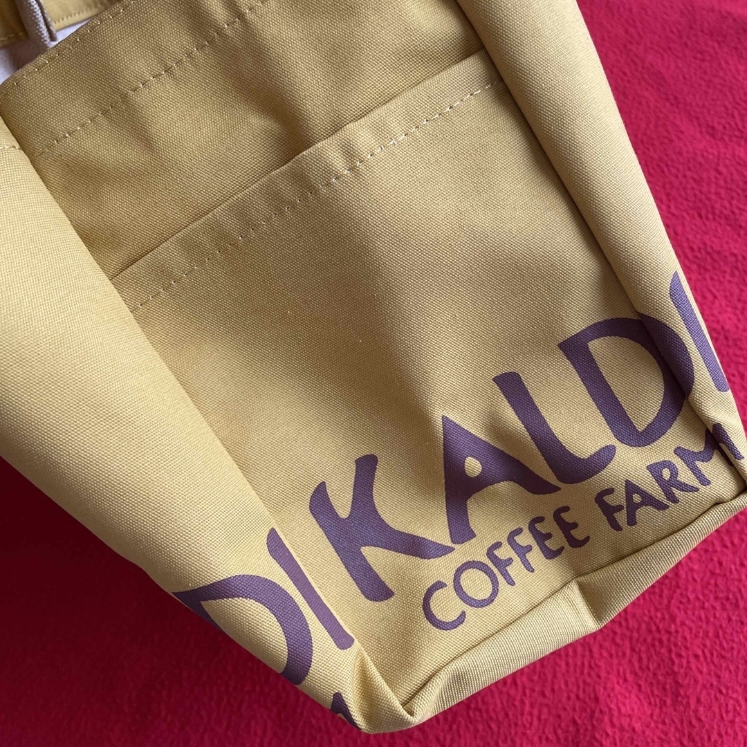 KALDI(カルディ)のカルディ KALDI トートバッグ 未使用 黄色 サイドにポケットあり￼ レディースのバッグ(トートバッグ)の商品写真