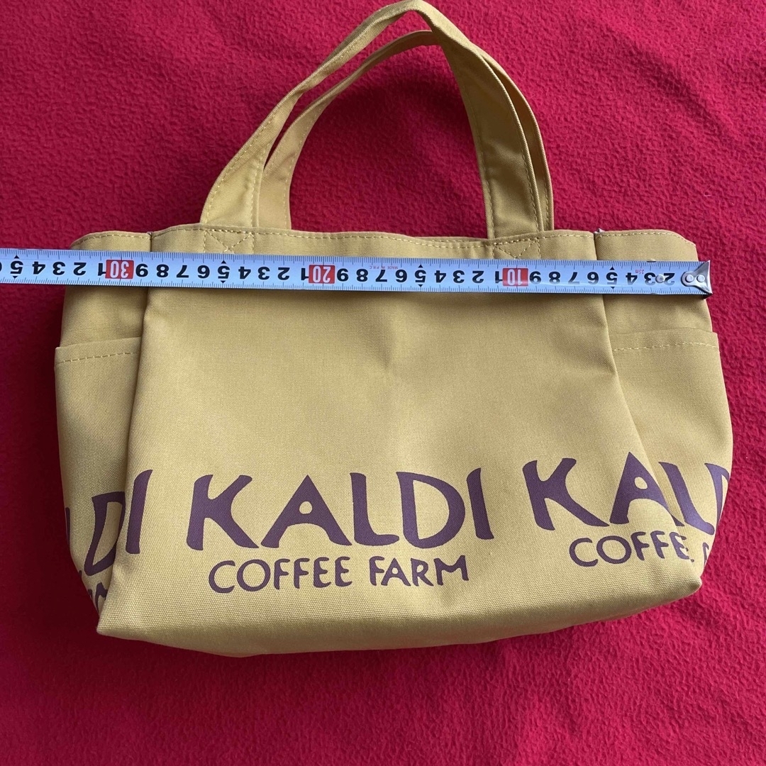 KALDI(カルディ)のカルディ KALDI トートバッグ 未使用 黄色 サイドにポケットあり￼ レディースのバッグ(トートバッグ)の商品写真