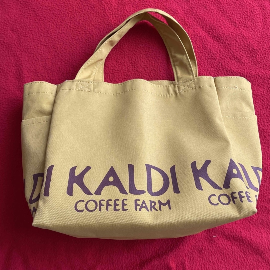 KALDI(カルディ)のカルディ KALDI トートバッグ 未使用 黄色 サイドにポケットあり￼ レディースのバッグ(トートバッグ)の商品写真