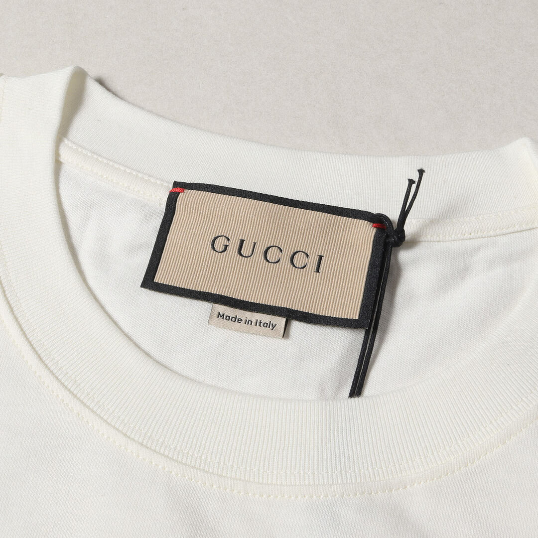 Gucci(グッチ)の新品 GUCCI グッチ Tシャツ サイズ:XS 現行モデル マルチカラー ブレード ロゴ クルーネック 半袖Tシャツ オーバーサイズフィット オフホワイト 白 イタリア製 トップス カットソー【メンズ】 メンズのトップス(Tシャツ/カットソー(半袖/袖なし))の商品写真