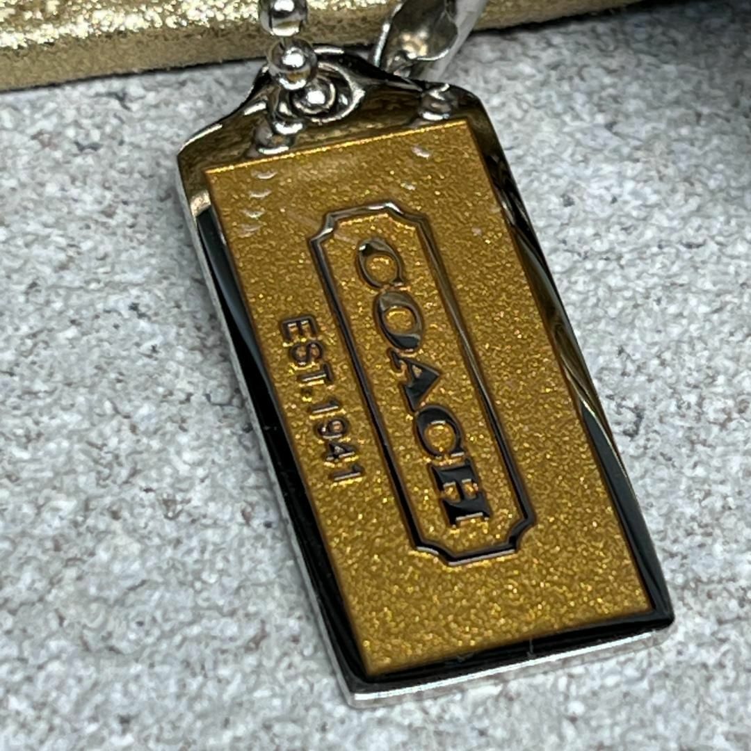 COACH(コーチ)のコーチ COACH ポーチ がま口 シグネチャー リボン ゴールド ベージュ レディースのファッション小物(ポーチ)の商品写真