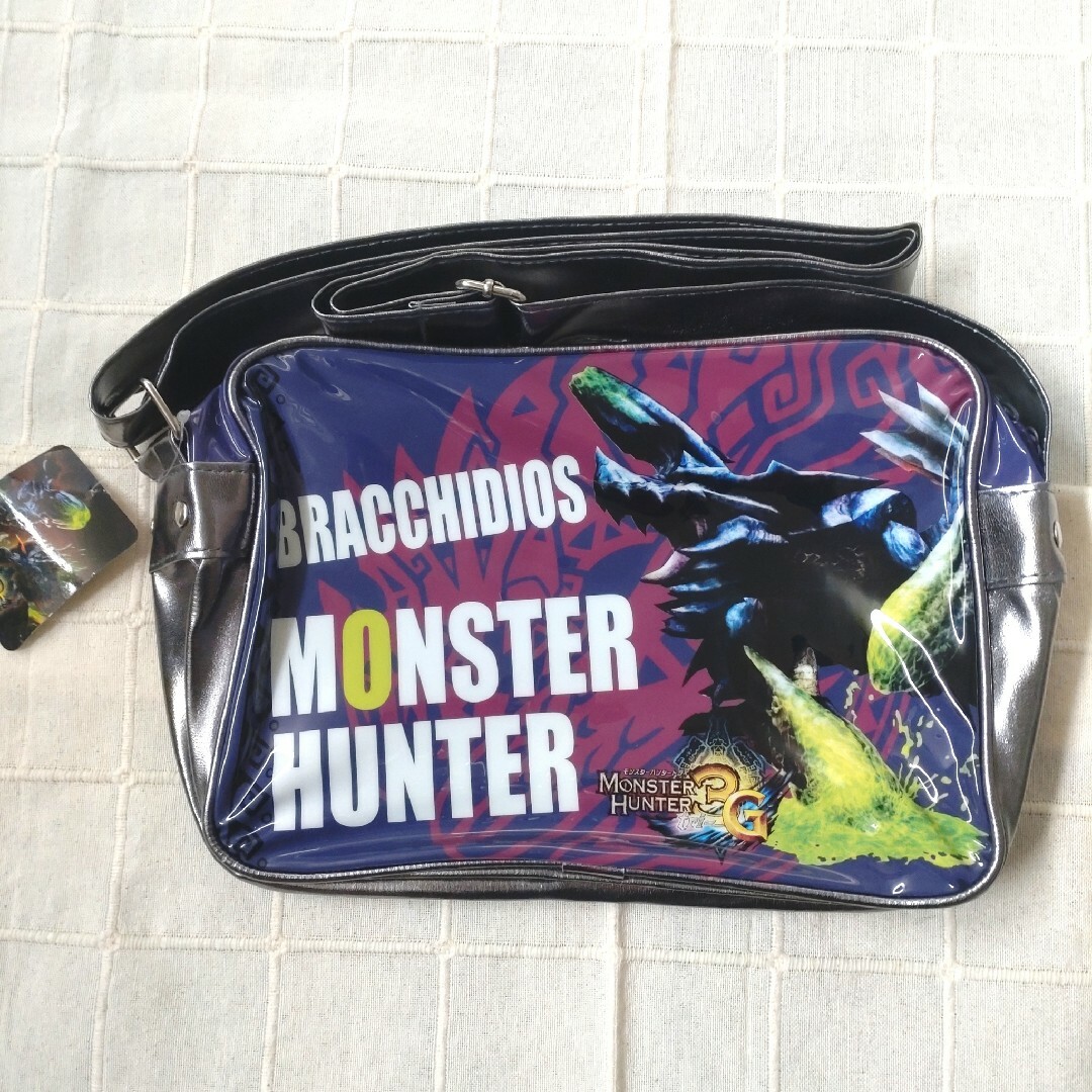 CAPCOM(カプコン)のモンスターハンター ショルダーバッグ ブラキディオス 新品 タグ付き エンタメ/ホビーのおもちゃ/ぬいぐるみ(キャラクターグッズ)の商品写真