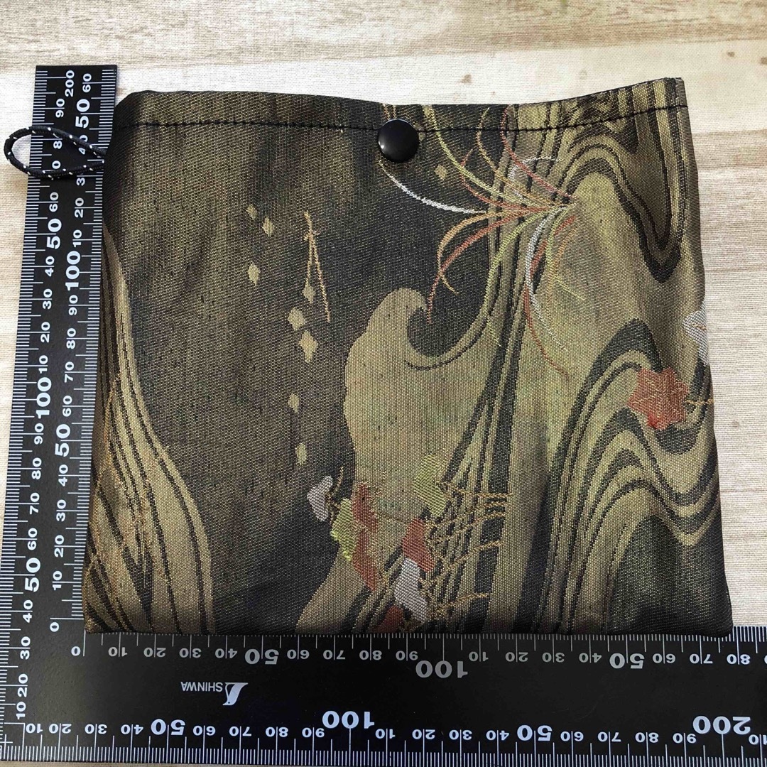 帯リメイク　ポーチ　金黒　サニタリーケース ハンドメイドのファッション小物(ポーチ)の商品写真