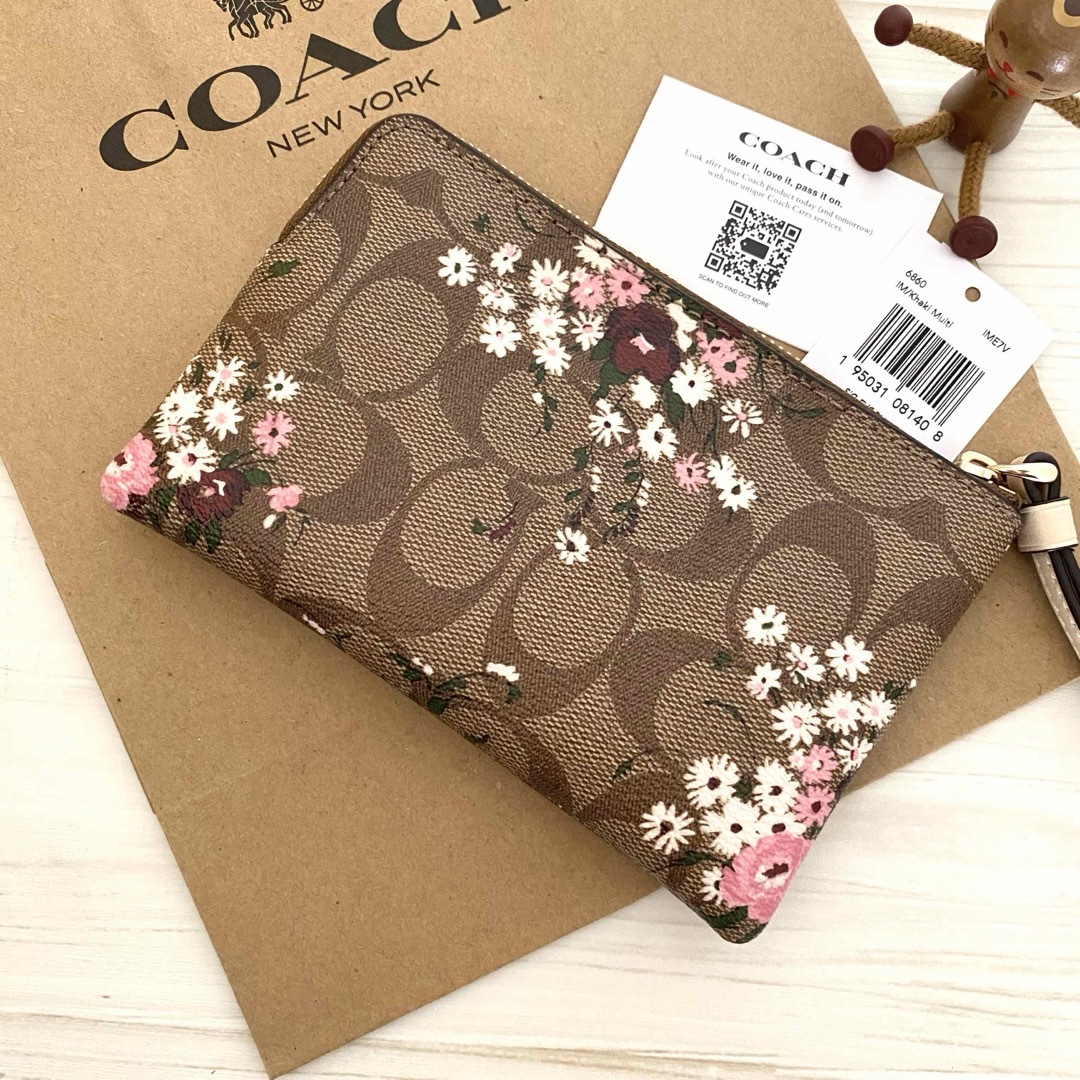 COACH(コーチ)のCOACH コーチ ポーチ財布　コーナージップリストレット 花柄  タバコケース レディースのファッション小物(ポーチ)の商品写真