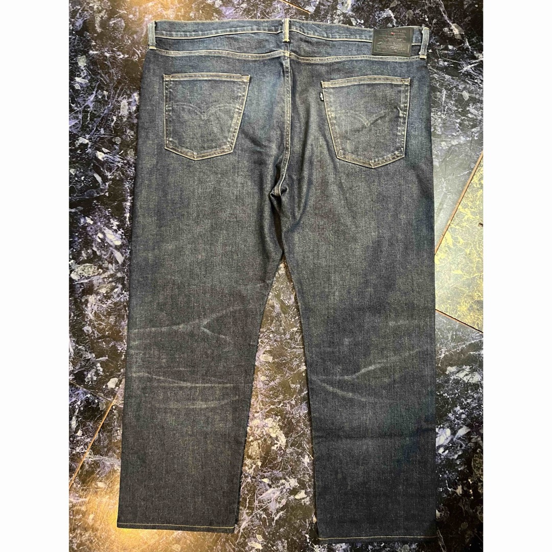 LEVI'S ブラックレザーパッチ 502taper メンズのパンツ(デニム/ジーンズ)の商品写真