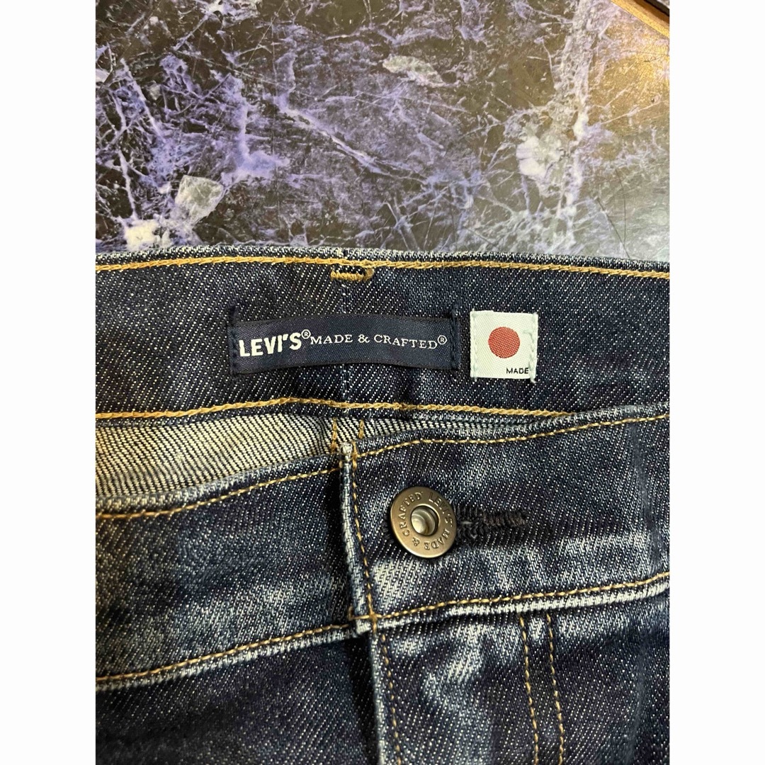 LEVI'S ブラックレザーパッチ 502taper メンズのパンツ(デニム/ジーンズ)の商品写真