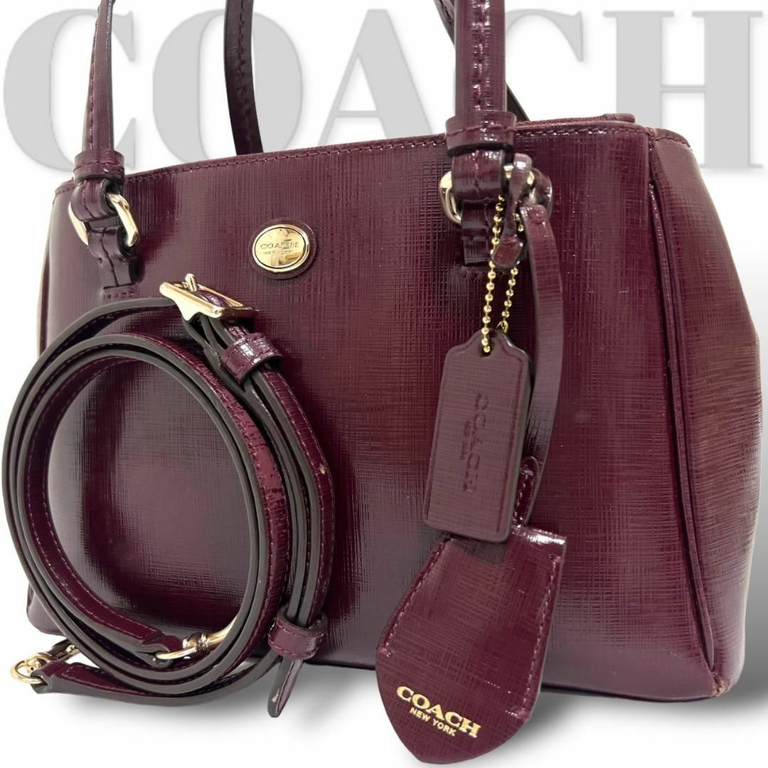 COACH(コーチ)の良品　コーチ　2way　ショルダーバッグ　ハンドバッグ　エナメル　ボルドー レディースのバッグ(ショルダーバッグ)の商品写真