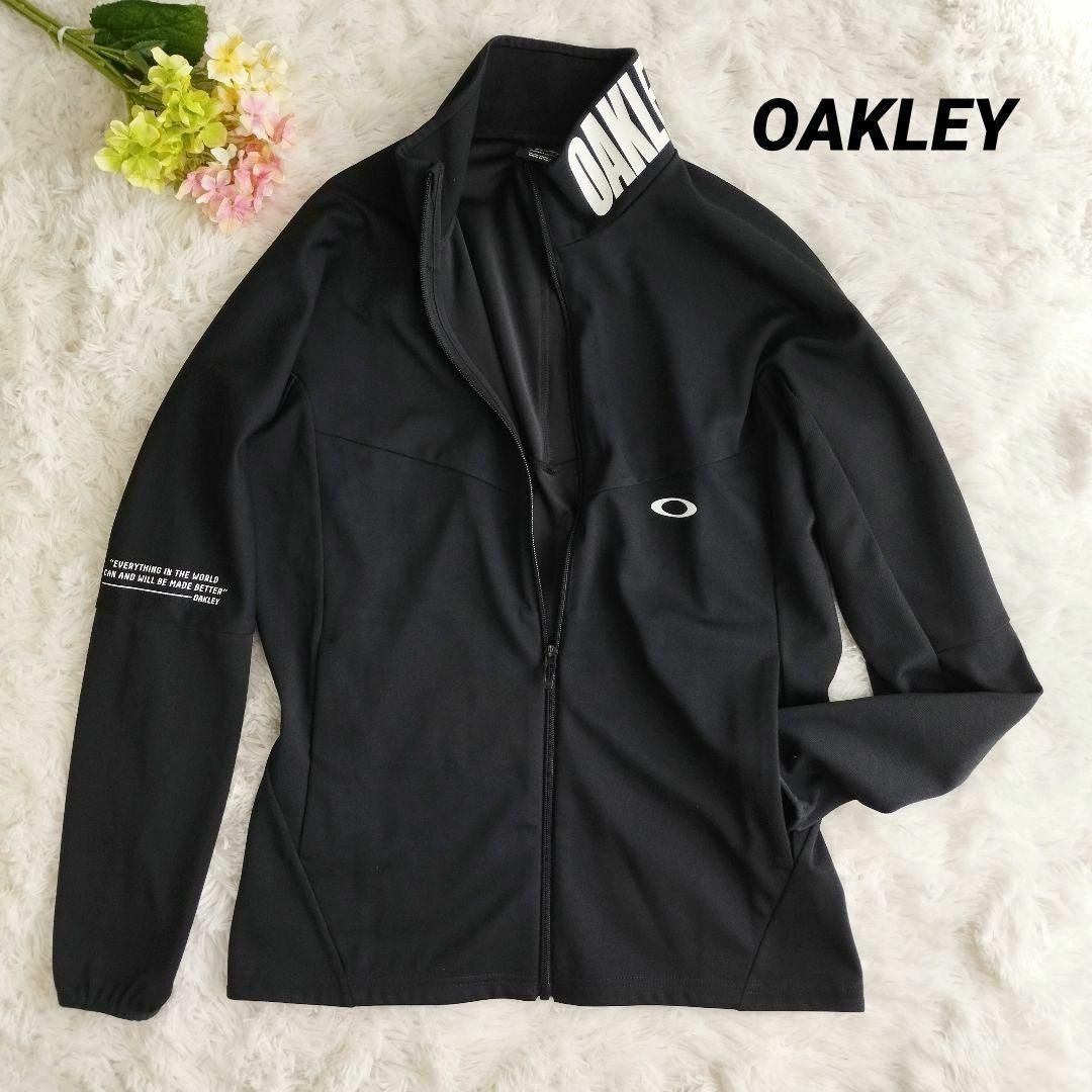 Oakley(オークリー)の美品　OAKLEY オークリー ジャージジャケット　黒　定価8800円　吸汗速乾 スポーツ/アウトドアのランニング(ウェア)の商品写真