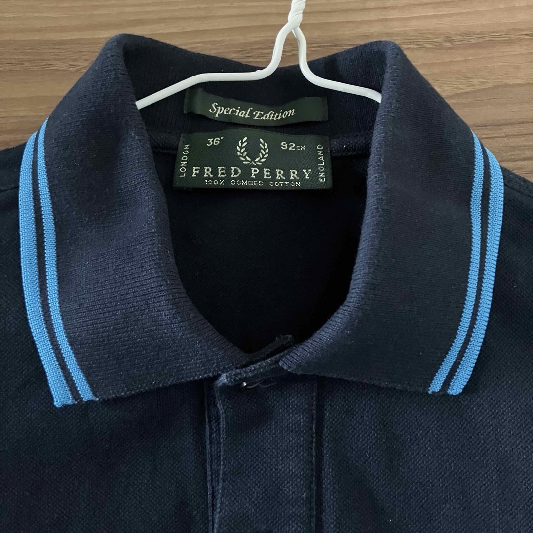 FRED PERRY(フレッドペリー)の【中古】FREDPERRY フレッドペリーポロシャツ ネイビー 36 イタリア製 メンズのトップス(Tシャツ/カットソー(半袖/袖なし))の商品写真