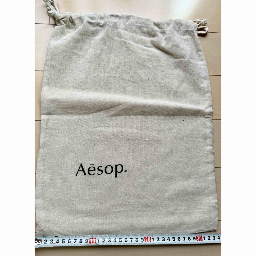 Aesop(イソップ)のイソップ　アンドラムアロマティック　ハンドバーム74mlと袋 コスメ/美容のボディケア(ハンドクリーム)の商品写真