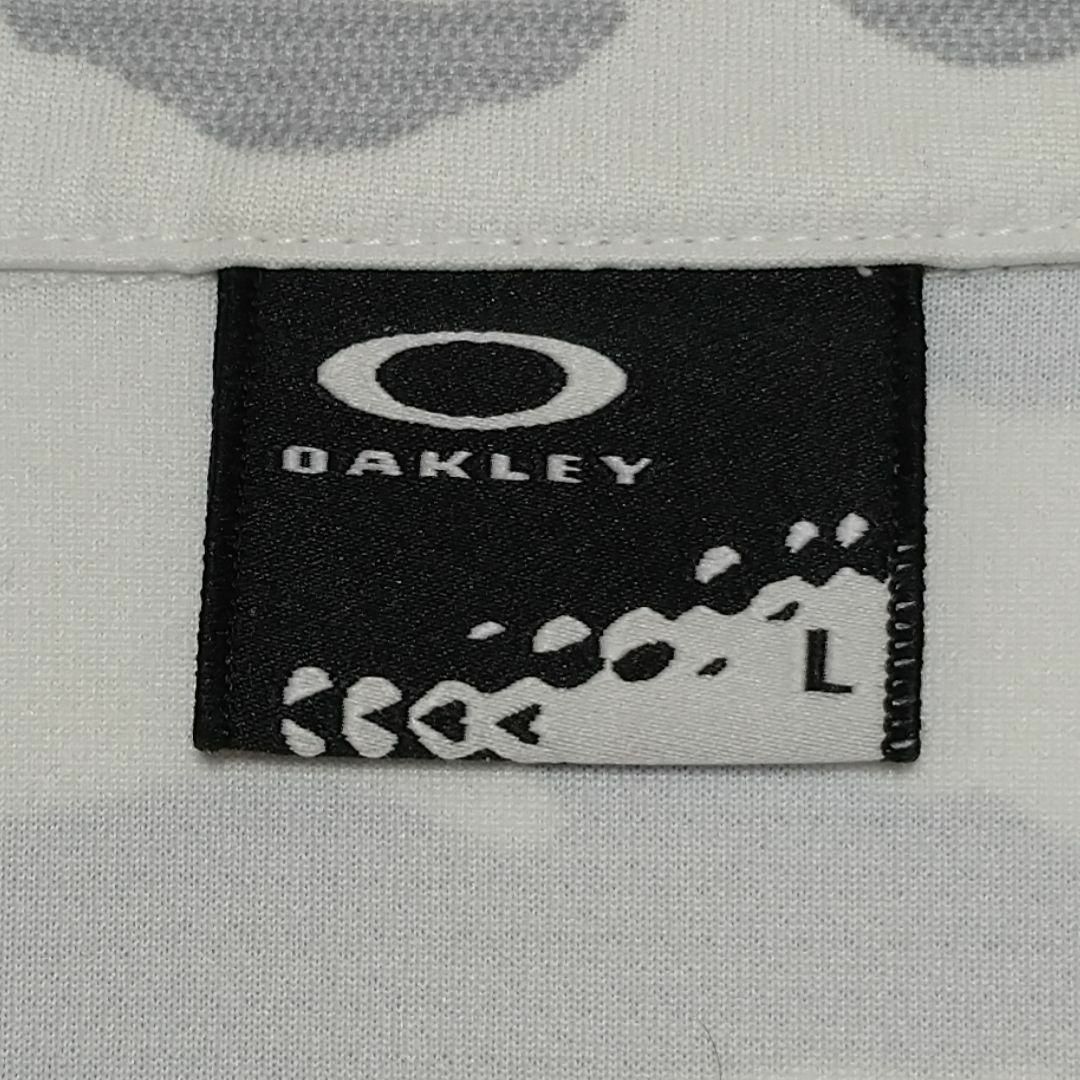 Oakley(オークリー)のオークリー　ゴルフ　カモフラ　迷彩　ポロシャツ　メンズ　L グレー　白　刺繍 スポーツ/アウトドアのゴルフ(ウエア)の商品写真