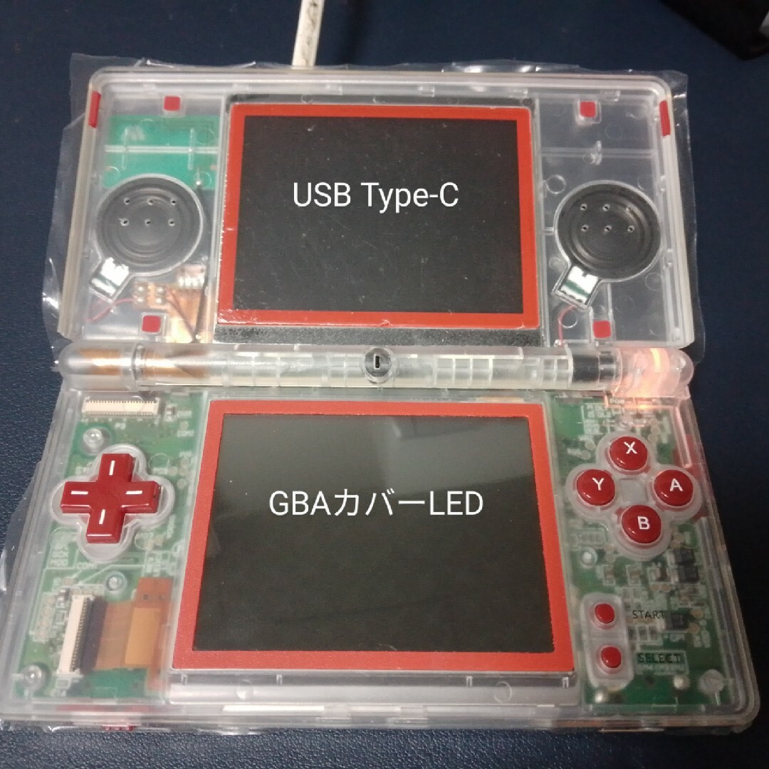 ニンテンドーDS(ニンテンドーDS)の【USB Type-C】DSlite クリアシェル（ボタンフレーム・レッド） エンタメ/ホビーのゲームソフト/ゲーム機本体(携帯用ゲーム機本体)の商品写真