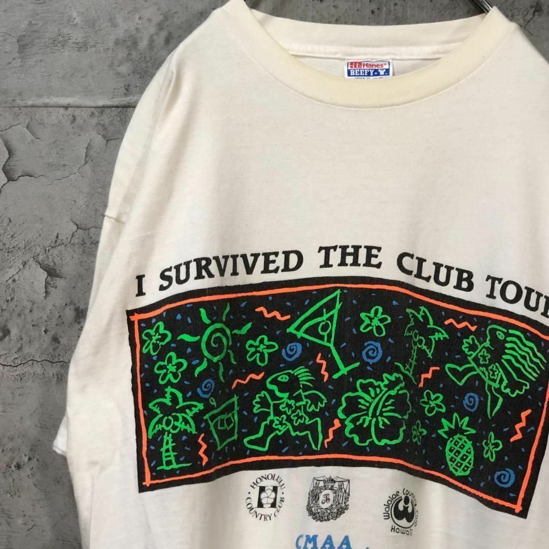 Hanes(ヘインズ)のI SURVIVED CMAA カクテル 太陽 ハイビスカス Tシャツ メンズのトップス(Tシャツ/カットソー(半袖/袖なし))の商品写真