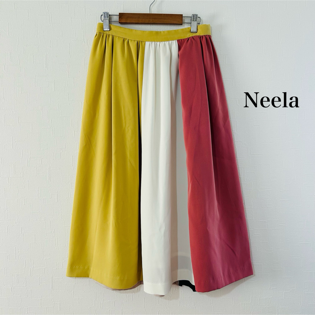 Neela マルチカラー ロングスカート フレアスカート イエロー ピンク 白 レディースのスカート(ロングスカート)の商品写真
