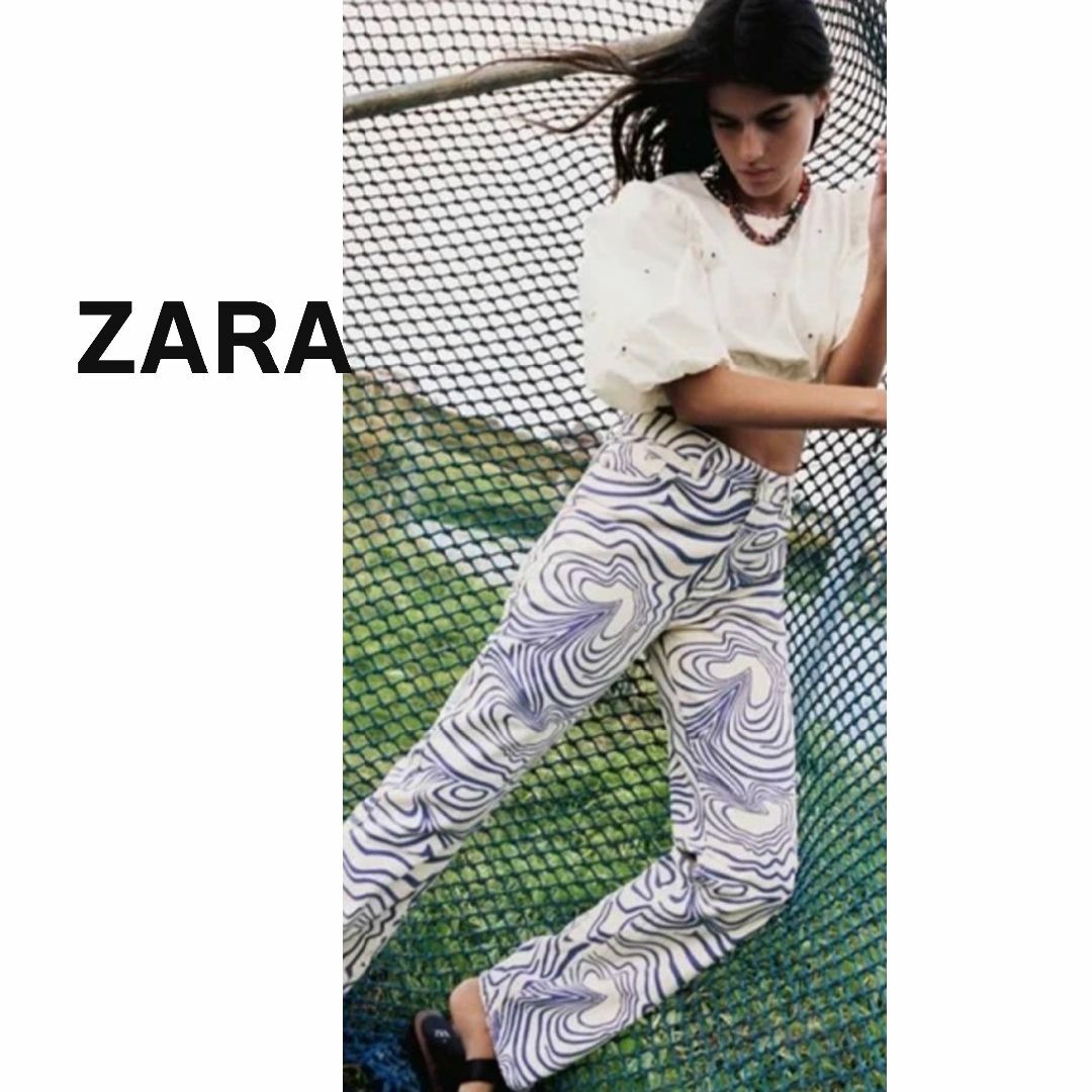 ZARA(ザラ)のZARA ザラ　パンツ　オフホワイト　白　ゼブラ　紫　パープル　ストレート レディースのパンツ(カジュアルパンツ)の商品写真